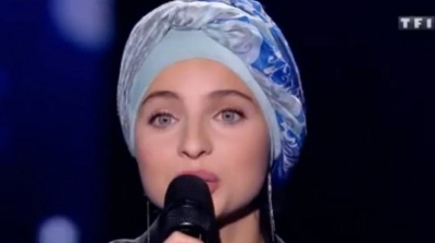 Mennel annonce qu'elle quitte The Voice