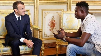 Macron annonce la naturalisation du sans-papiers Malien qui a sauvé un enfant du vide