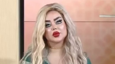 مذيعة عراقة تثير الجدل بسبب إطلالتها الغريبة (صور)