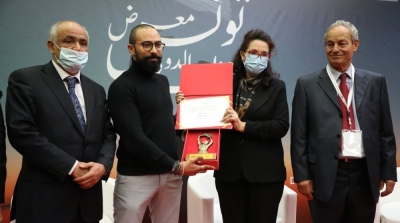 طارق اللموشي يتحصل على جائزة معرض الكتاب للقصة القصيرة 